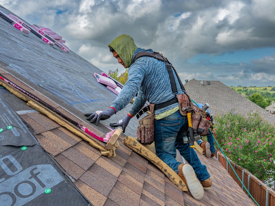 Workers on a residential roof