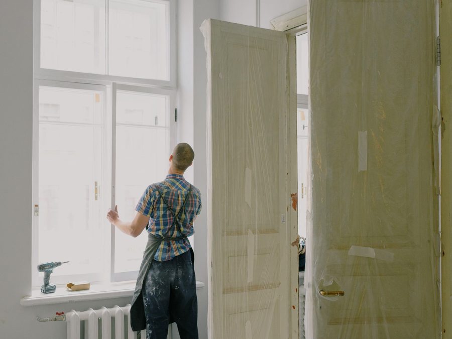 Worker fitting a replacement window